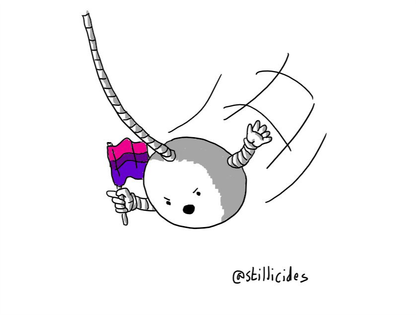 A spherical robot suspended on a long cable, swinging into view waving a bisexual flag and angrily pointing and gesticulating.