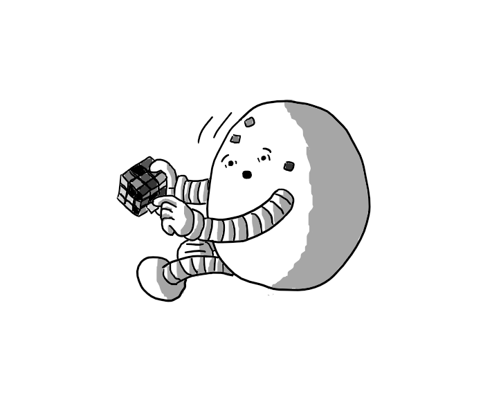 An ovoid robot with banded arms and legs holding a Rubik's Cube in one hand while it peels off a sticker with the other. Several other stickers from the cube have become stuck to its face. It's turning around, shocked, as if caught in the act.