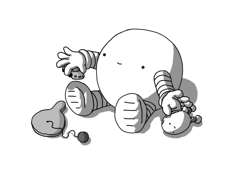 A spherical robot with banded arms and legs, sitting on the floor and smiling slightly. It has a toy car in one hand and is reaching for a miniature Bigbot with the other. A paddle ball is on the ground next to it.