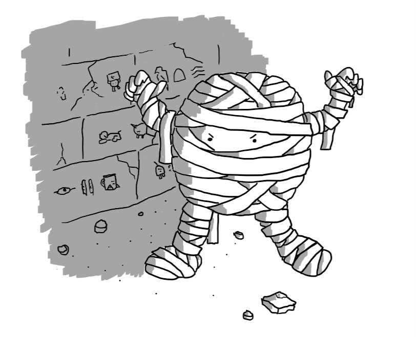 A round robot wrapped in bandages like an Egyptian mummy, lurching forward with its arms raised menacingly. Behind it is a stone wall marked with ancient Egyptian hieroglyphics that also include images of Teabot, Notokaybot, Unicornbot and Spiderbot.