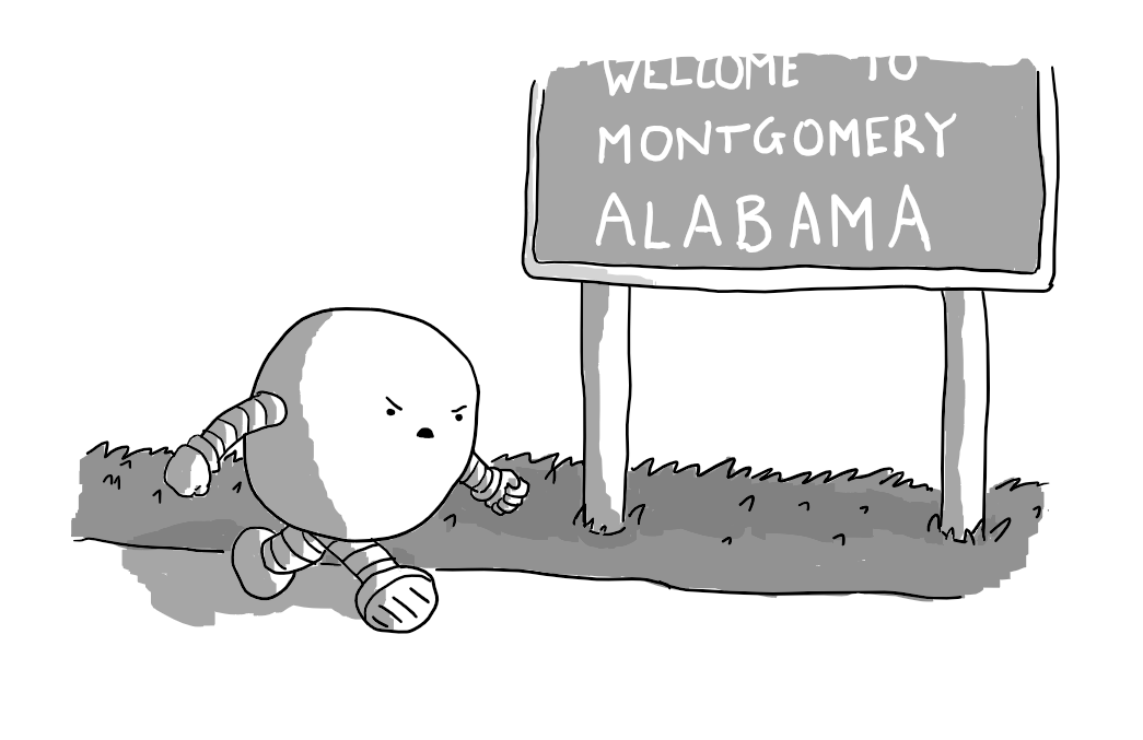 A roughly spherical robot with banded arms and legs, marching angrily past a sign reading "WELCOME TO MONTGOMERY ALABAMA"