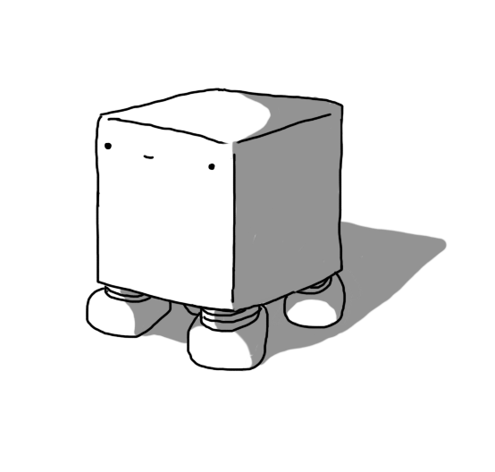 A cubical robot with four very short, banded legs on its underside. It has a faintly smiling face near the top of one of its sides.