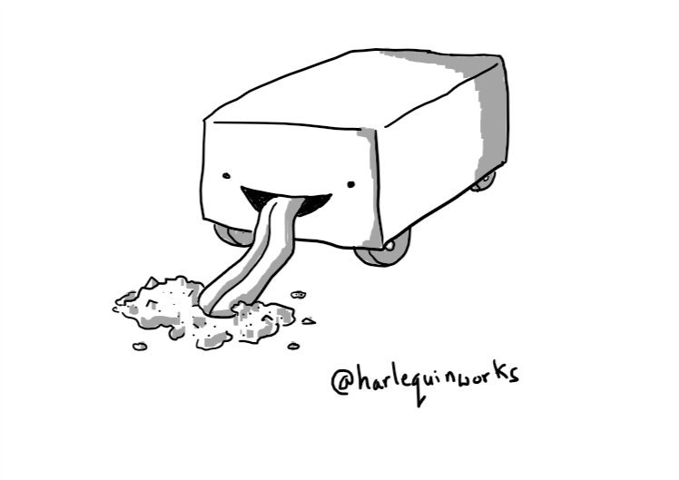 A cuboid robot on four wheels tucked under its sides. Its face is on one of its short ends and a long tongue is extending from its mouth to lap at a pile of sawdust on the floor.