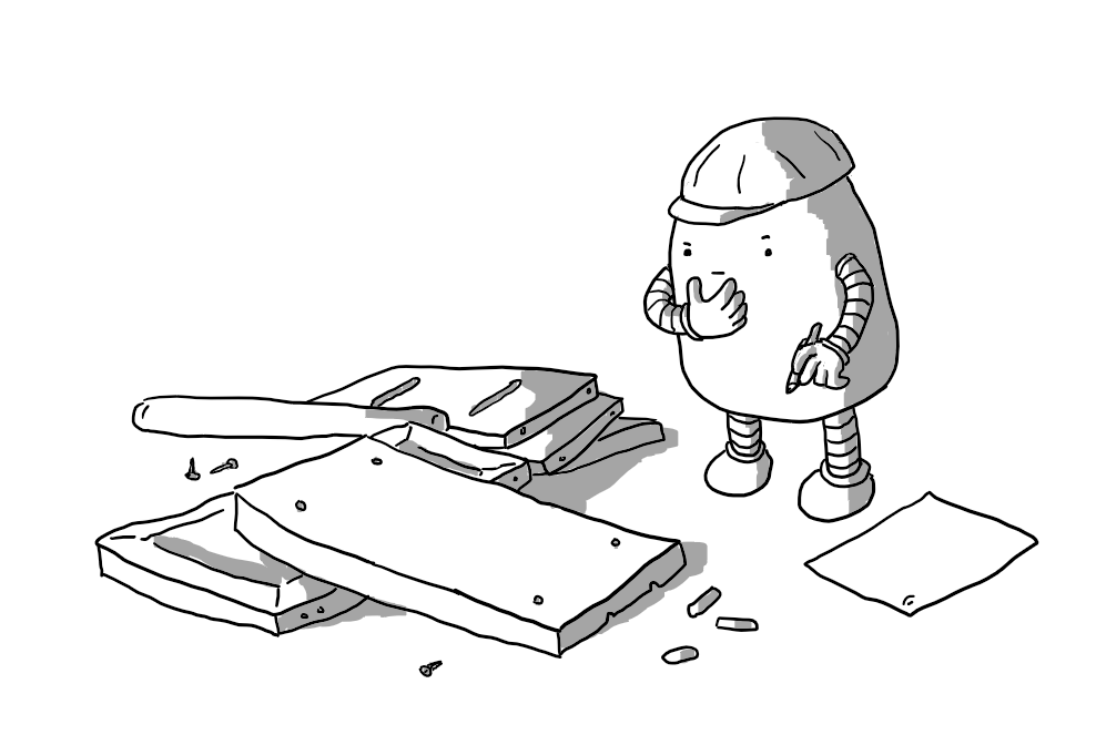 A rounded oblong robot with banded arms and legs musing over a pile of wooden panels, dowels, rods and screws. It is rubbing its chin thoughtfully as a pencil is poised in its other hand. At its feet is a sheet of paper that is blank aside from the number 1 near the top. The robot also wears a hard hat.