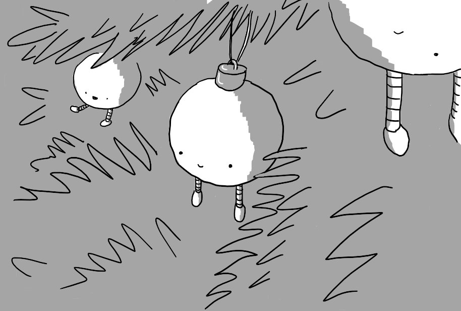 A robot bauble hanging in dense, dark pine needles. It has a little smiling face near the bottom and two small, dangling legs underneath. In the background is another one, smiling as it kicks its legs, and partially visible in the foreground is a third, apparently asleep.