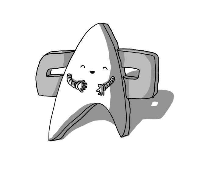 A robot in the form of a Star Trek DS9/Voyager combadge, with its face and arms on the Starfleet chevron. The robot is smiling with its eyes closed, as if giggling, and its arms are held towards its midsection.