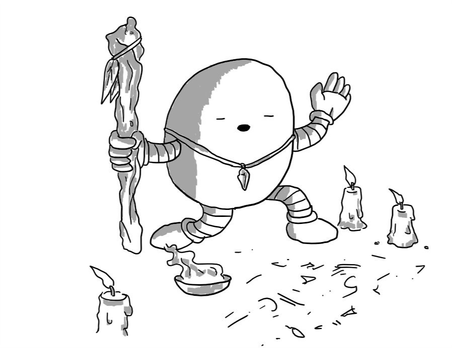 An ovoid robot holding a gnarled wooden staff hung with feathers in one hand, wearing a crystal pendant as a necklace and kneeling with its free hand raised and its eyes closed, mouth open as if speaking. It's surrounded by guttering candles, has a bowl of smoking incense and the floor in front of it is inscribed with arcane symbols.