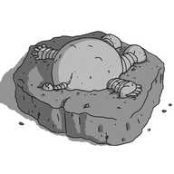 A spherical robot with banded arms and legs and an antenna, made of stone and partially embedded in a rough slab of rock with a few pieces of rubble scattered on the floor around it. The robot is lying down, angled with its top towards the viewpoint, its eyes closed as if asleep.
