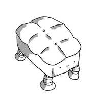 A robot in the form of a rectangular cushioned footrest with its legs replaced with banded robot legs and a little smiley face on one of the short ends.