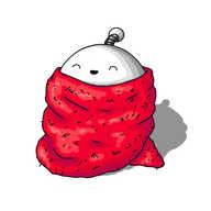 A round robot with a banded antenna, wrapped up in a big red blanket. Only the top of the robot is visible, its eyes are closed and it's smiling happily.