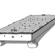 A robot in the form of a long, low cuboid with four short banded legs, each positioned at one corner. Atop it is a layer of soil and grass, which is marked out as a football (soccer) pitch, complete with goals and corner flags. A game is underway, with players, officials and support staff all visible as tiny stick figures. The robot's smiling face is on one of the cuboid's narrow ends.