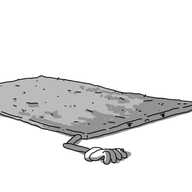 A robot in the form of a rectangular, deep-pile rug, lying on the ground. It has two jointed arms emerging from its long edges, positioned close to one end, which also has the robot's face on it. The robot's hands are positioned as if gripping onto the floor, and its face looks very grumpy.