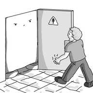 A man leaving a public toilet and opening the door to find a cuboid robot with short, banded legs entirely blocking the exit, looking very angry.