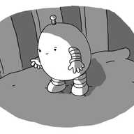 A little ovoid robot with chubby banded arms and legs, standing on a pillow with a sympathetic expression on its face.