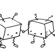 Two cuboid robots with spring-like legs and antennae, smiling and holding hands. They look like delightful little cubes of sugar.