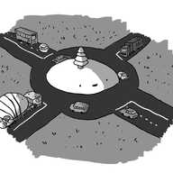 A robot in the form of a traffic island in a roundabout, with a robotic pine tree for an antenna. Four roads meet at the roundabout, and various vehicles are driving around it. A small Carbot is approaching from one direction and a flatbed lorry carrying a sleeping Bigbot from another.